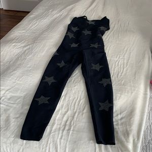 ULTRACOR jumpsuit with hologram stars